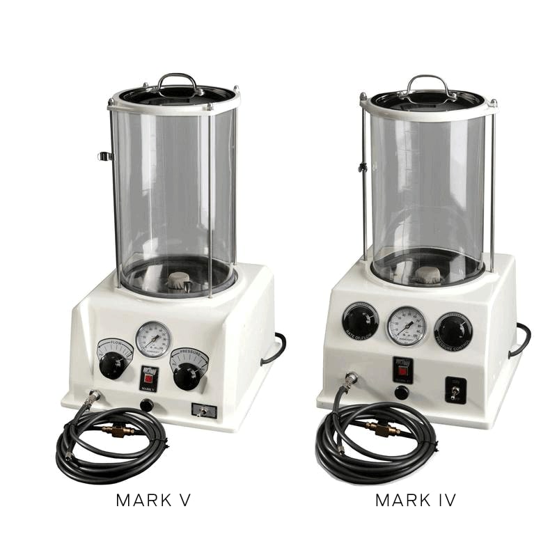 Figure 5 — The archetype, and still in the catalog: the ESCO Porti-Boy in Mark V and Mark IV form, side by side. Graduated tank above, motor and pump in the base, and on the panel the pressure gauge and rate-…