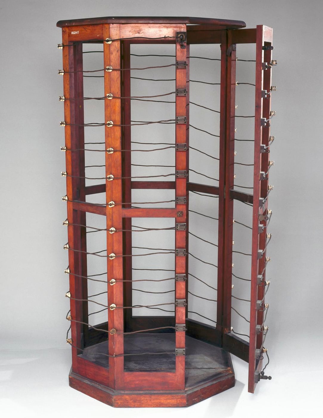 Figure 3 — The d'Arsonval "cage": a large solenoid of heavy copper turns inside which the patient sat or reclined, heated by induction from the high-frequency field rather than by direct contact.