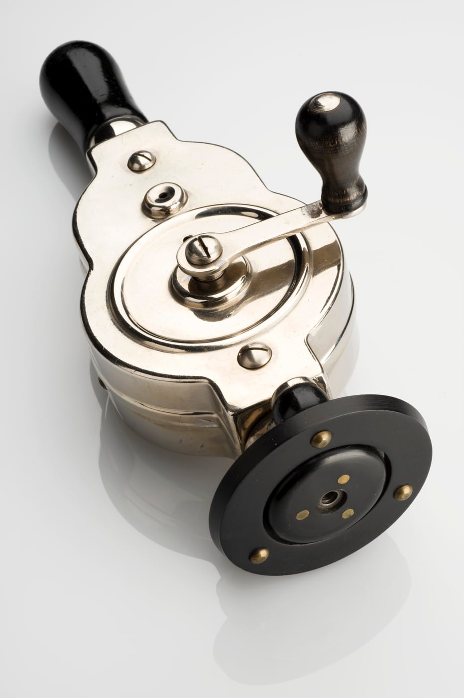 Figure 3 — Dr Macaura's "Pulsocon" Blood Circulator: a hand-cranked mechanical vibrator in its fitted case, sold with claims to cure rheumatism, paralysis, and organic disease.