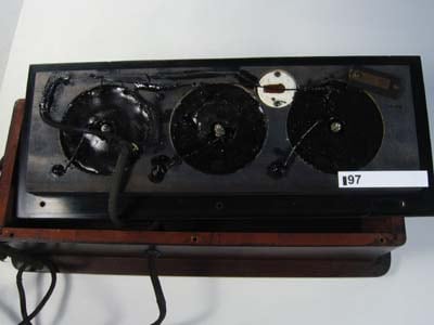 Figure 1 — An Abrams "Oscilloclast" treatment box with its case removed, showing the ordinary resistors, coils and small motor within — components wired to no coherent purpose. When investigators opened the s…